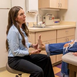 Photo Example Doctor and Foot Patient