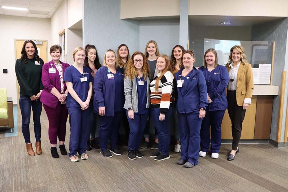 Group photo of all the MA program graduates with the HCH program instructors