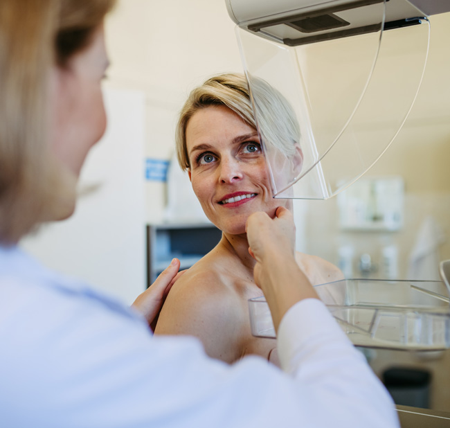 woman receiving a mammogram