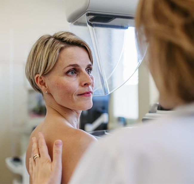 Woman receiving a mammogram