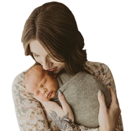 HCH mom Berlandie Harris holding newborn baby cropped