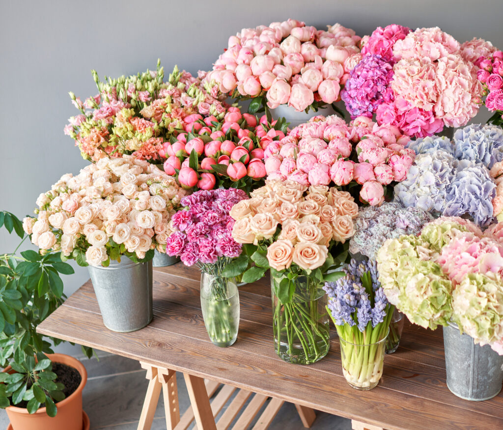 Flowers in vases sitting on a table